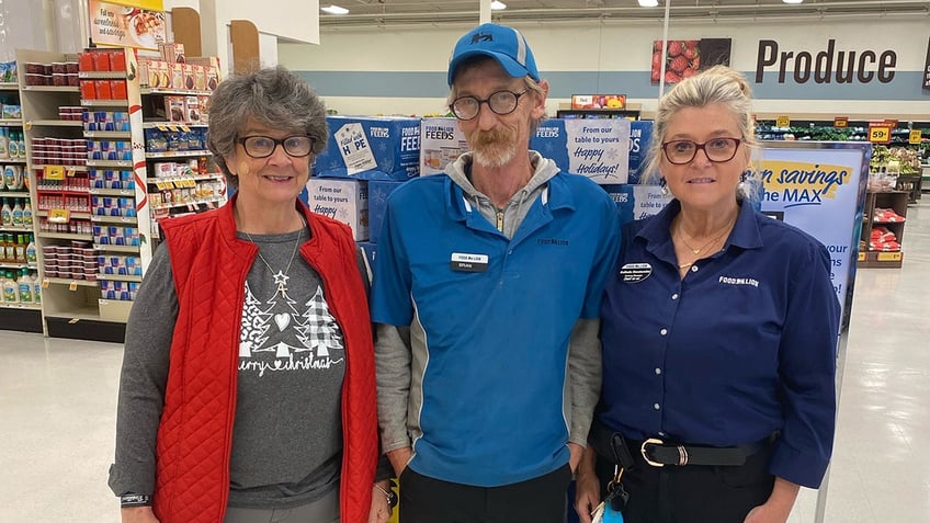 homeless vet with workers