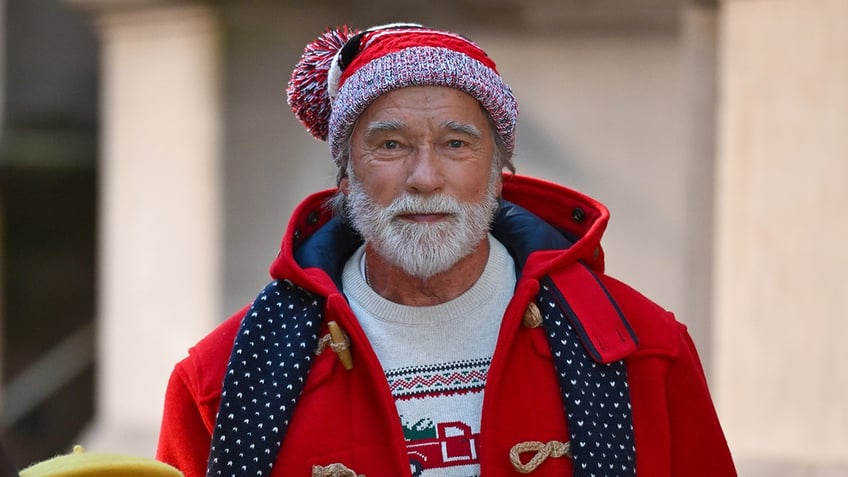 Close up of Arnold Schwarzenegger in character as Santa Claus filming "The Man with the Bag"