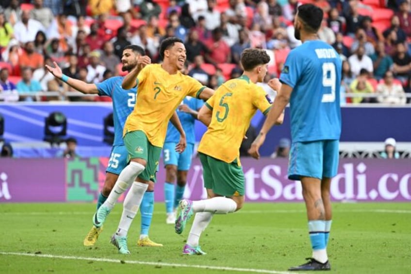 Australia's Jordan Bos celebrates after scoring his team's second