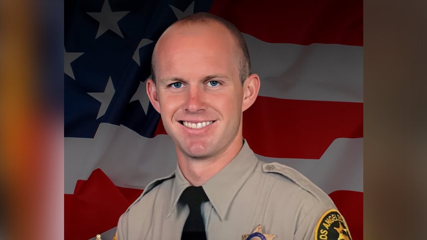 arrest made in ambush killing of la sheriffs deputy sources