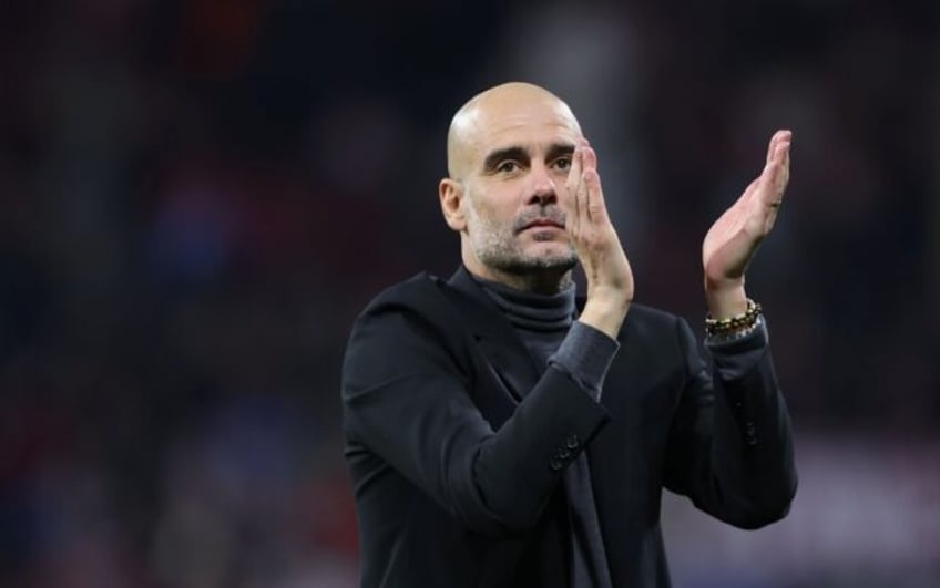 arsenal are back as major force says man city boss guardiola