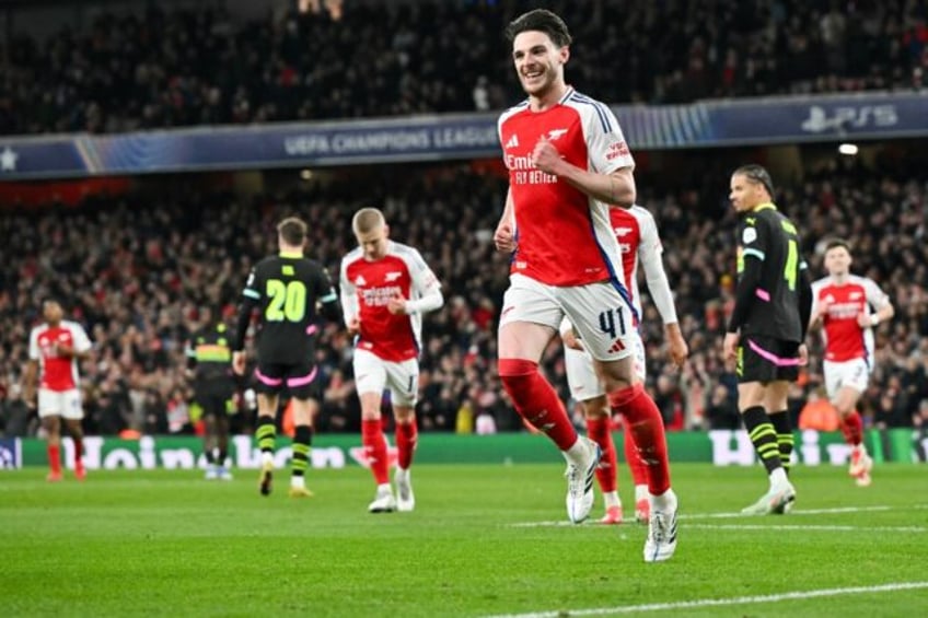 Arsenal midfielder Declan Rice celebrates his goal against PSV Eindhoven