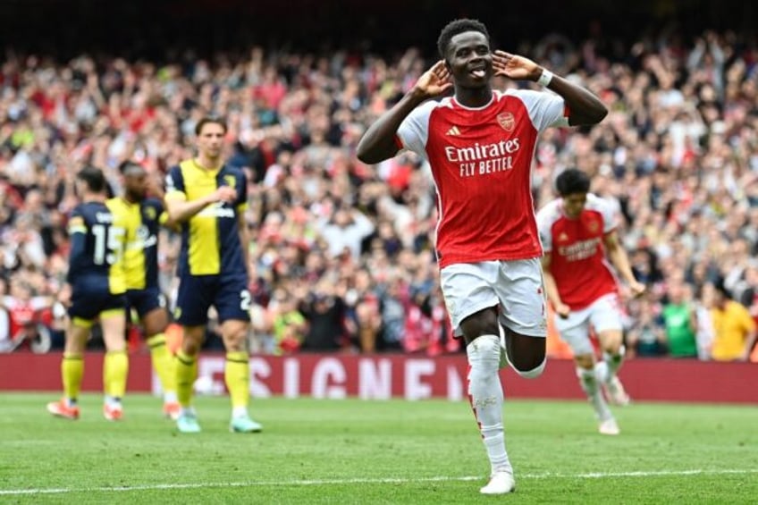 Arsenal's Bukayo Saka celebrates scoring against Bournemouth