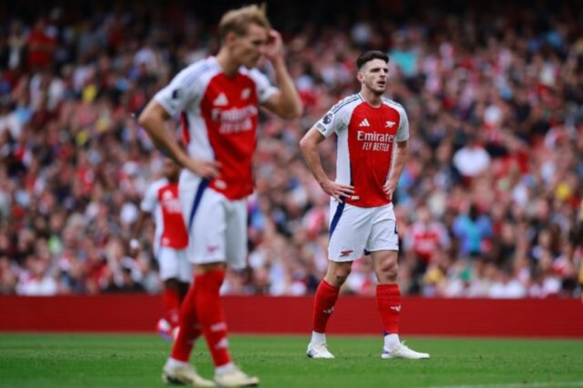 Arsenal midfielder Declan Rice (R) was sent off against Brighton