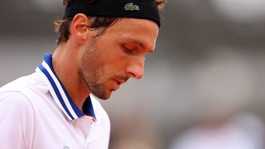 Arthur Rinderknech looks on during a French Open match