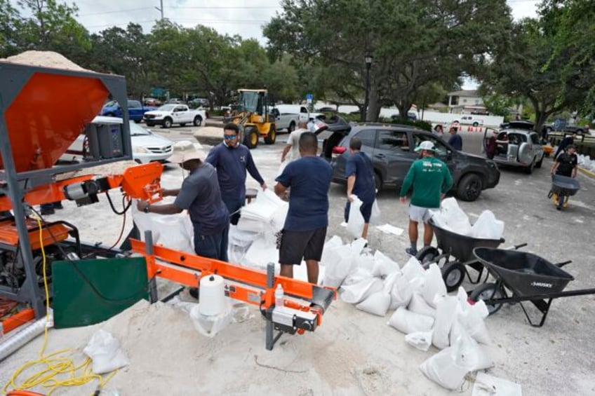 as idalia churns toward florida residents urged to wrap up storm preparations