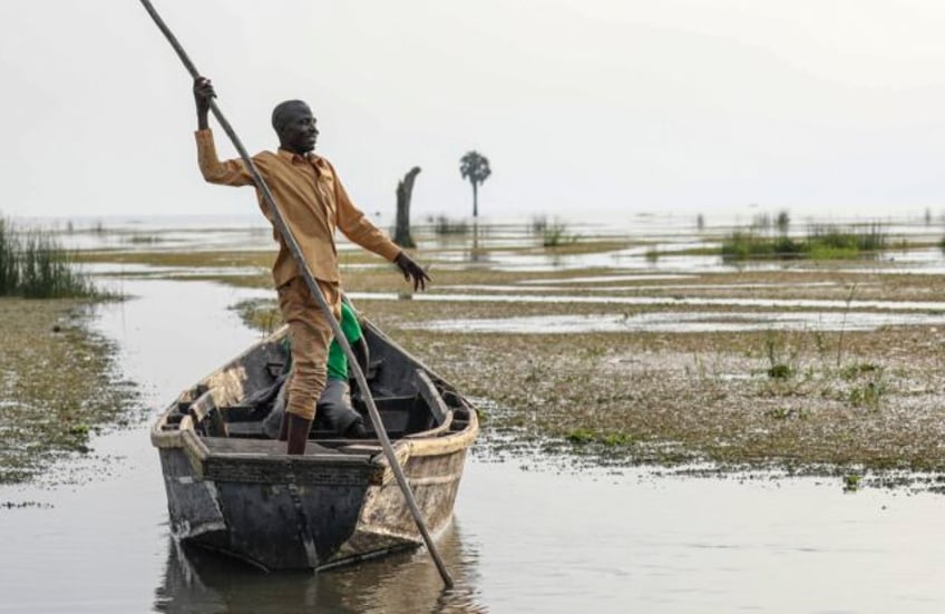 as oil activities encroach on sacred natural sites a small ugandan community feels besieged