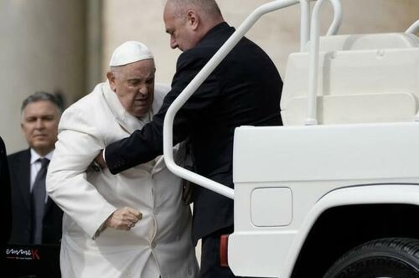 as pope francis enters 8th day in hospital vatican suggests possible resignation