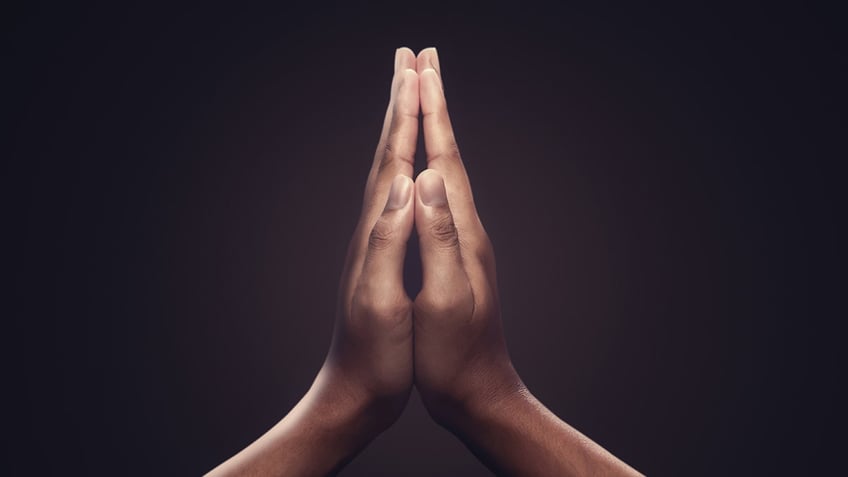 Hands in prayer