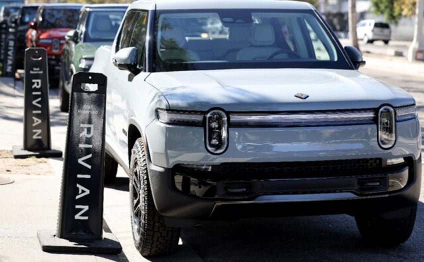 Shares of Rivian and other electric vehicle companies fell after US President Donald Trump