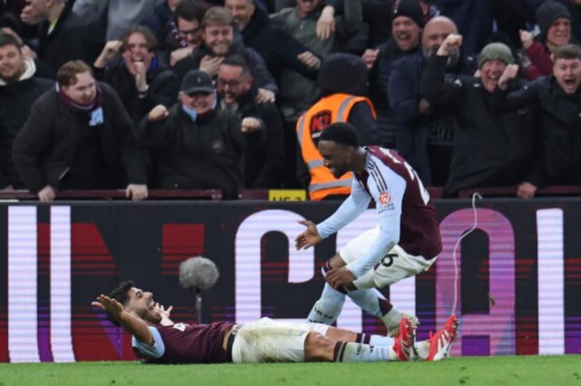 Aston Villa's Marco Asensio (L) celebrates after scoring against Chelsea