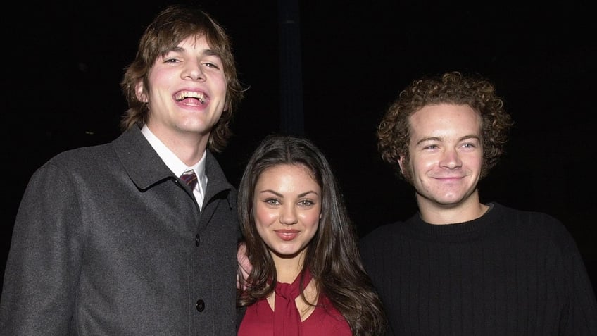 ashton kutcher and mila kunis seemingly shaded by actress christina ricci for danny masterson support