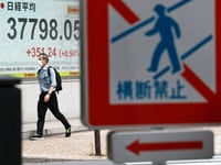 Asian shares shoot higher as US stocks inch toward their records