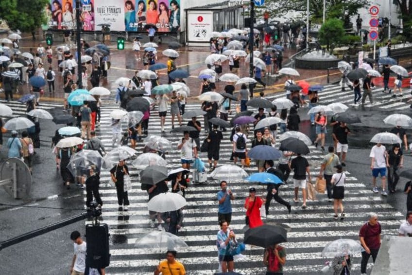 Tokyo's Nikkei plunged more than four percent at one point as it led more losses across As