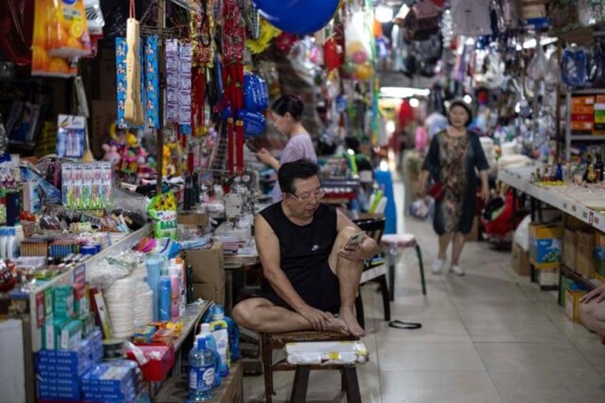 Consumer spending in China rose in July but was outpaced by manufacturing