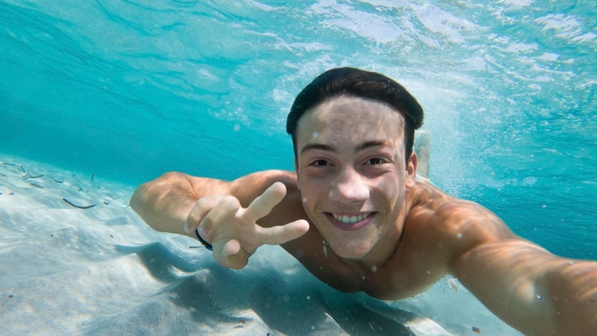 Man swimming underwater