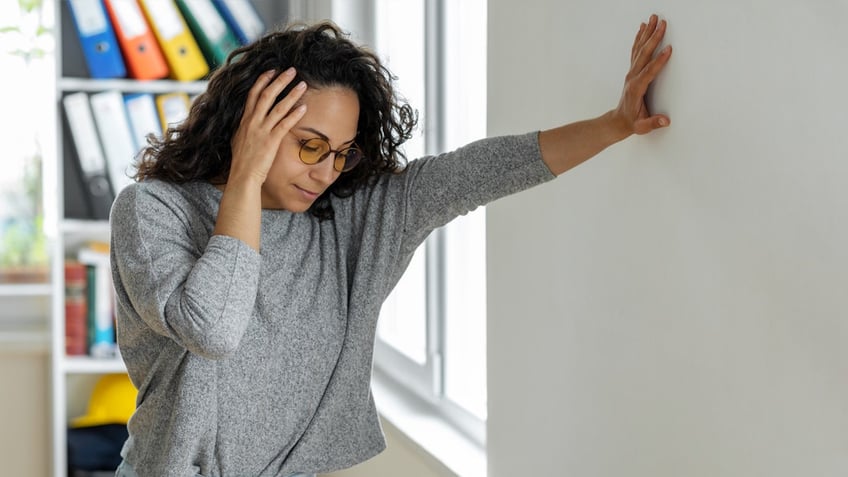 Woman losing balance