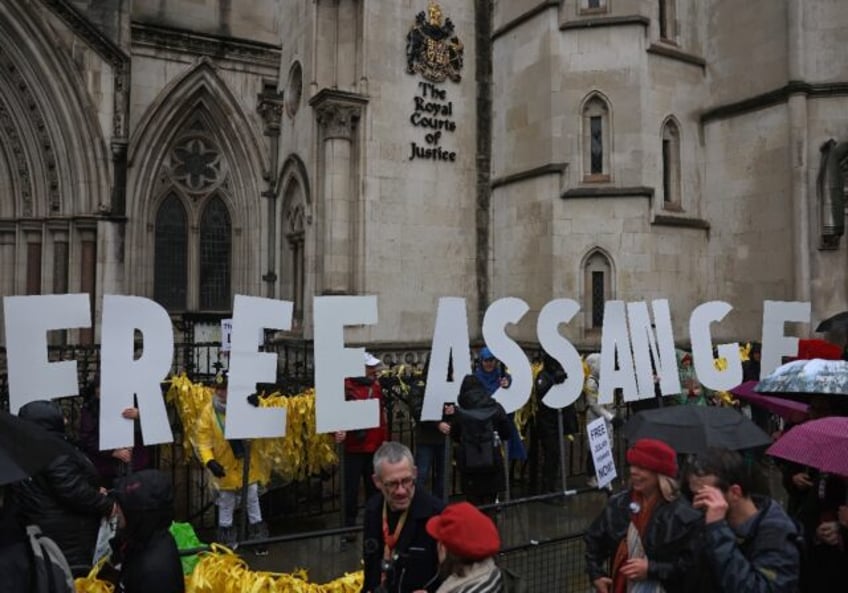 Supporters of Assange and Wikileaks demonstrated outside the London court Wednesday