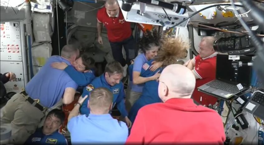 SpaceX Dragon Crew-10 members greet International Space Station crew members including NAS