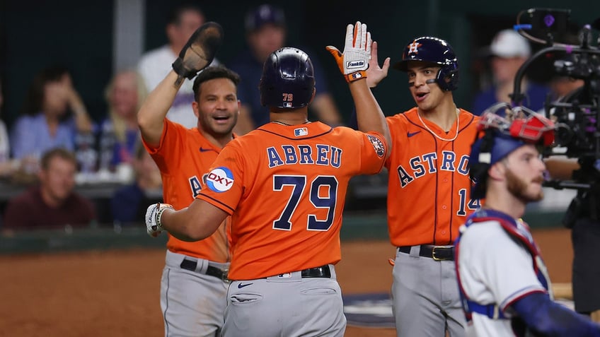 astros even alcs with blowout win over rangers