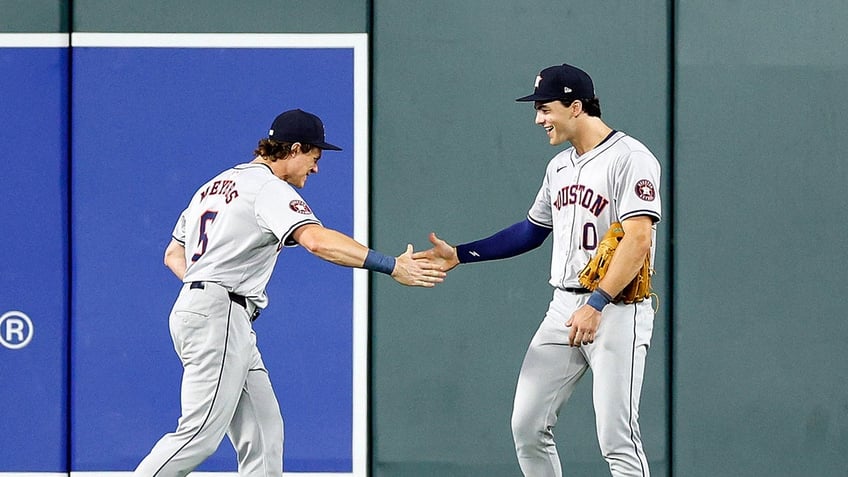 Joey Loperfido celebrates his catch