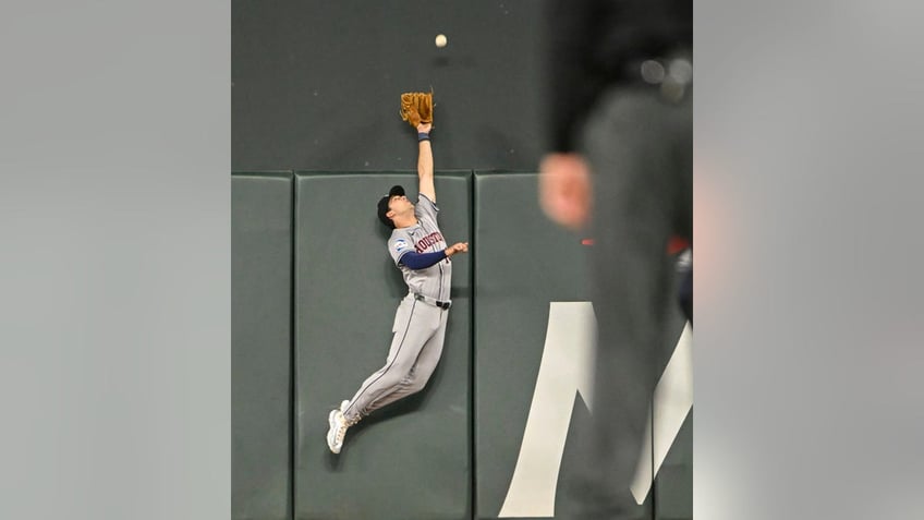 Joey Loperfido catches a fly ball