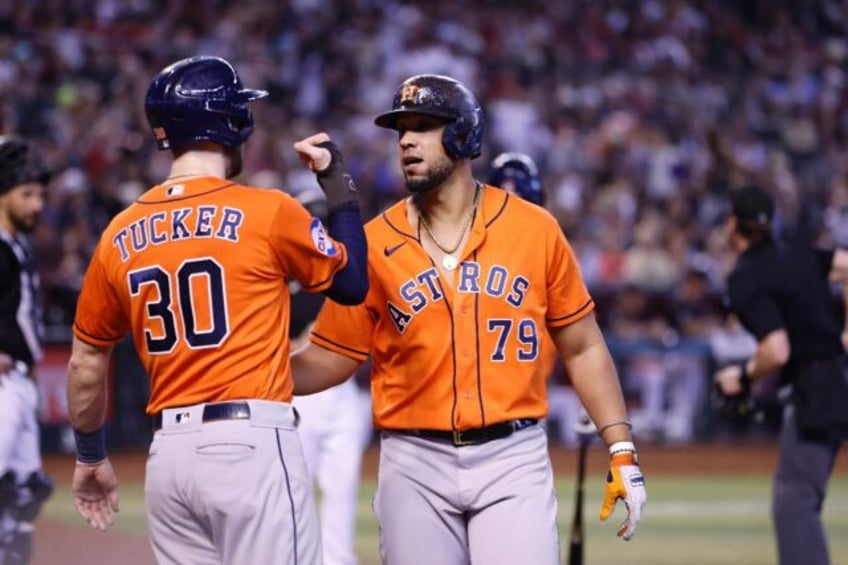 astros win to grab first round mlb playoff bye after rangers loss