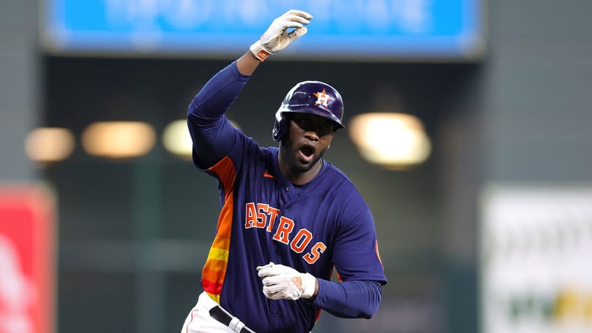 Yordan Alvarez celebrates home run