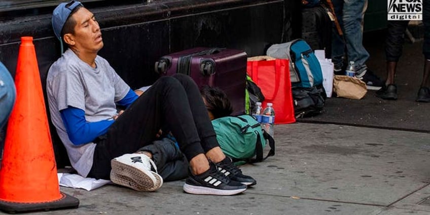 asylum seekers sleep on new york city sidewalk with manhattans roosevelt hotel at full capacity