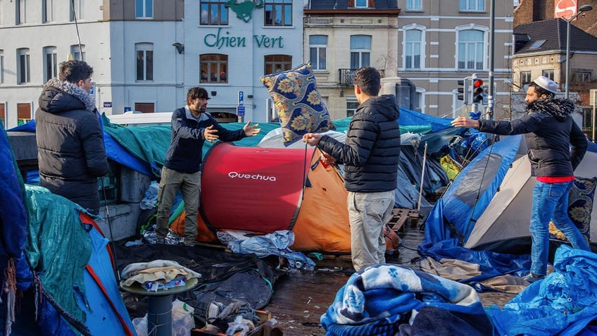 asylum shelters in belgium to no longer accept single men to make room for women children