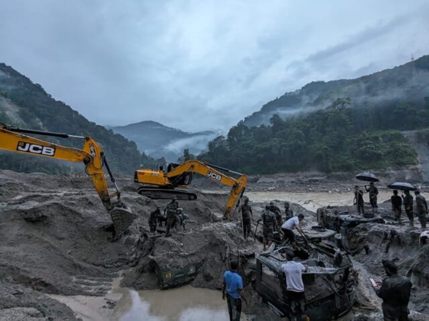 at least 10 dead 102 missing in india glacial lake burst