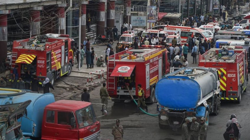 at least 10 dead 22 injured as fire rips through pakistan mall