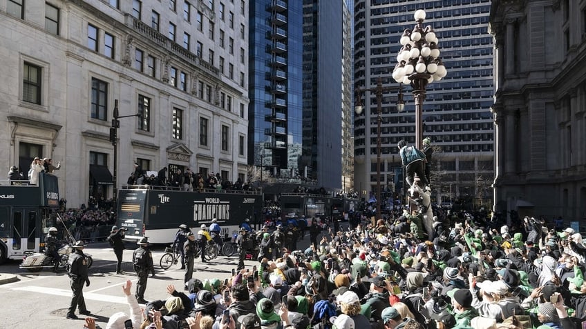 People take part in the Philadelphia Eagles victory parade, after they won the Super Bowl LIX against the Kansas City Chiefs. Philadelphia, Pennsylvania, U.S., February 14, 2025. 