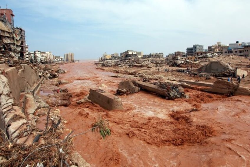 at least 2300 dead in libya floods but far higher toll feared