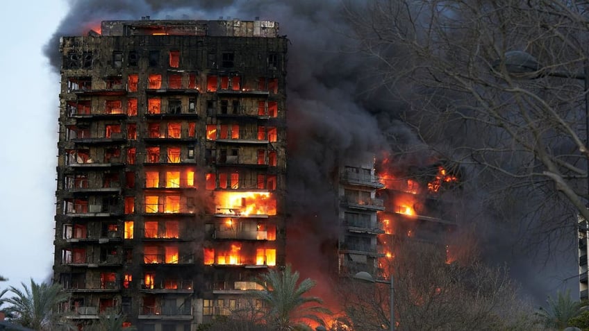 An apartment building on fire