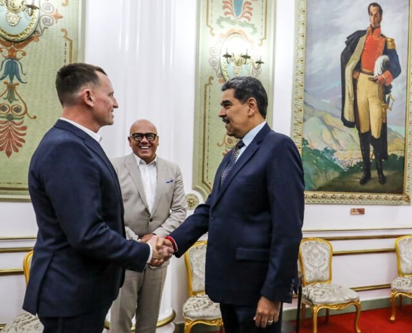 Venezuelan President Nicolas Maduro (R) received US special envoy Richard Grenell in Carac