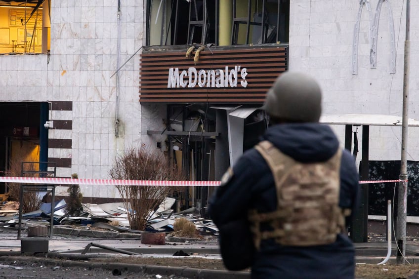 KYIV, UKRAINE - JANUARY 18: A policeman stands in front of damaged entrance to metro station and McDonald's after Russian attack with ballistic missiles on January 18, 2025 in Kyiv, Ukraine. As a result of the strikes on the central district of the capital, cars caught fire, an administrative building, a business center and a store were partially destroyed. One of the buildings caught fire. A water main was damaged, causing one of the streets to flood. Several people died as a result of the attack. (Photo by Yevhenii Zavhorodnii/Global Images Ukraine via Getty Images)