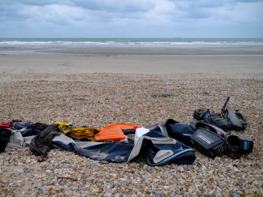 WIMEREUX, HAUTS-DE-FRANCE, FRANCE - NOVEMBER 26: Personal belongings of people who attempted the cross the English Channel lay on the beach on November 26, 2021 in Willemeux, Pas-de-Calais, France. After the boat accident in the English Channel which claimed at least 27 lives, the dispute between London and Paris over …