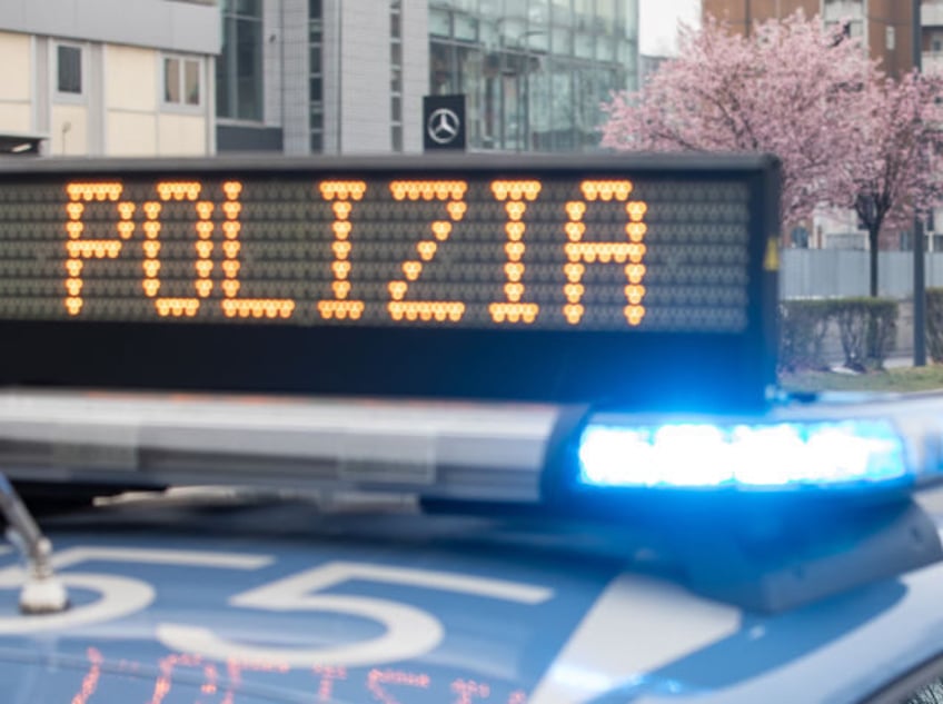 MILAN, ITALY - MARCH 10: An Italian State Police officer looks on at a checkpoint on March