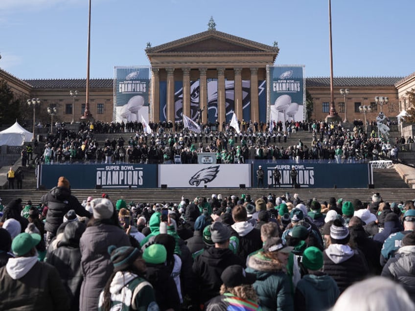 Fans listen at the base of the Philadelphia Art Museum during the Philadelphia Eagles&#039