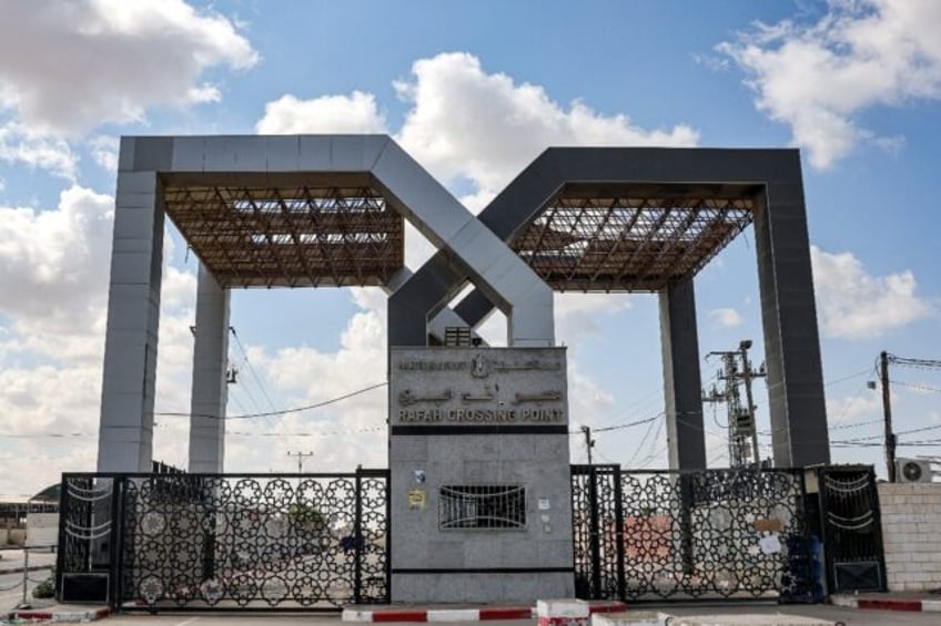 at the gates of gaza aid piles up in egypt