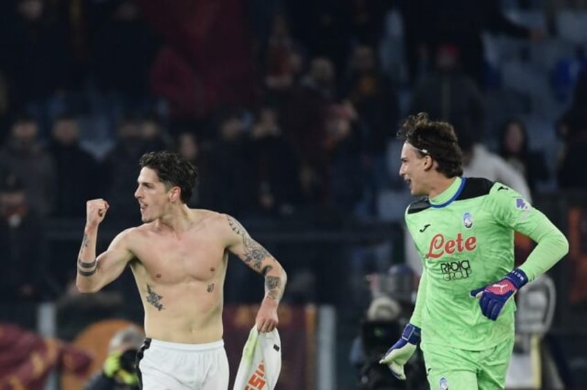 Nicolo Zaniolo (L) celebrates scoring Atalanta's second goal against his old team Roma