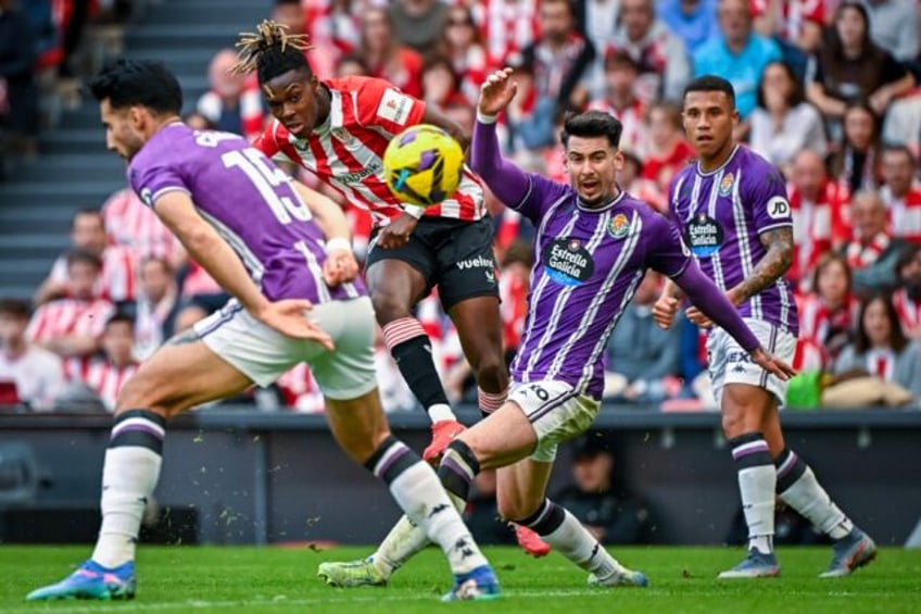 Athletic Bilbao's Spanish forward Nico Williams (2L) hit two goals as his side hammered lo