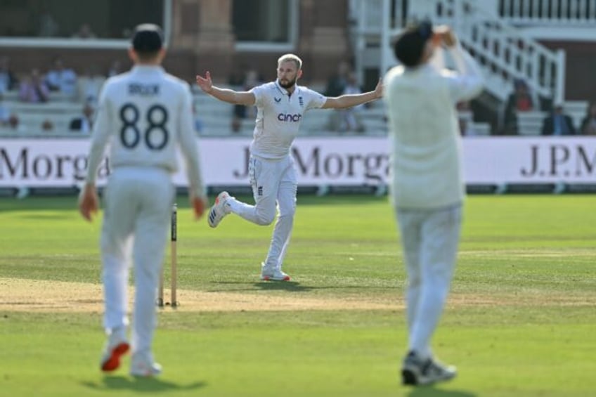 Gus Atkinson (C) removes Sri Lanka's Milan Rathnayake to claim a five-wicket haul at Lord'