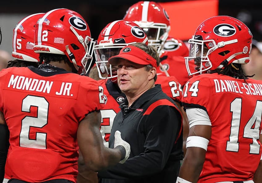 atlanta journal constitution fires reporter after making corrections to uga football abuse story