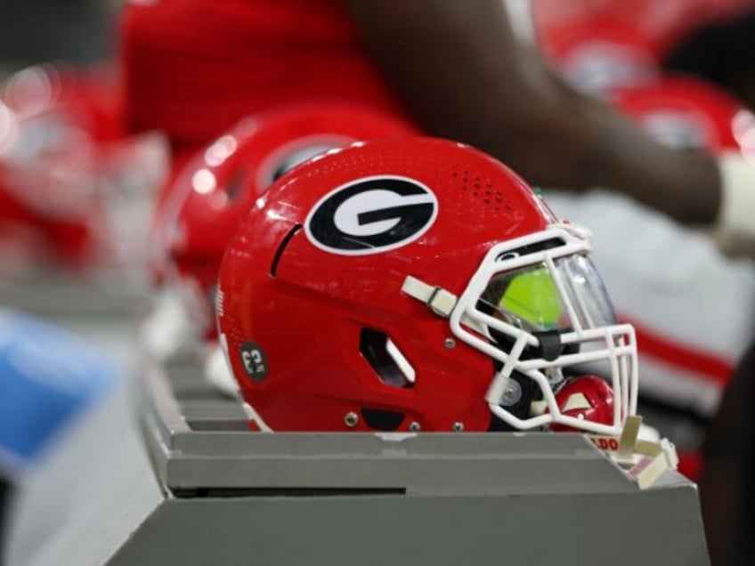 atlanta journal constitution fires reporter after making corrections to uga football abuse story