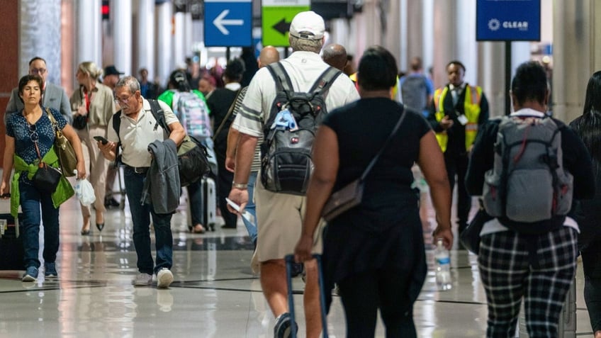 atlanta travelers say plain clothed dea agents seized their cash at the gate after they passed security check