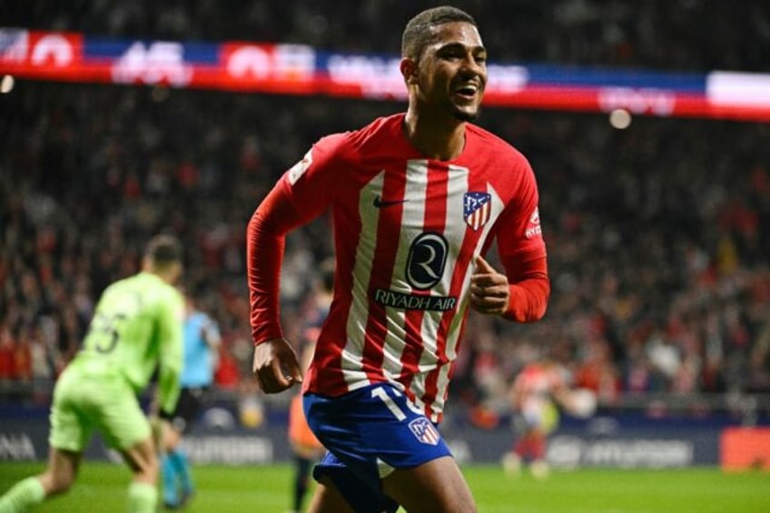 Atletico Madrid forward Samuel Lino celebrates scoring the opening goal against Valencia at the Metropolitano Stadium