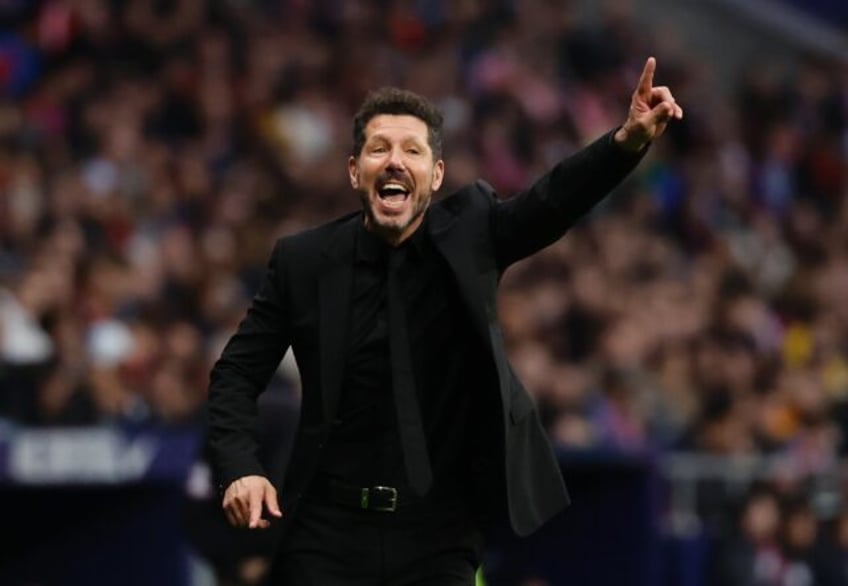 Atletico Madrid's Argentine coach Diego Simeone gestures on the touchline during his 700th