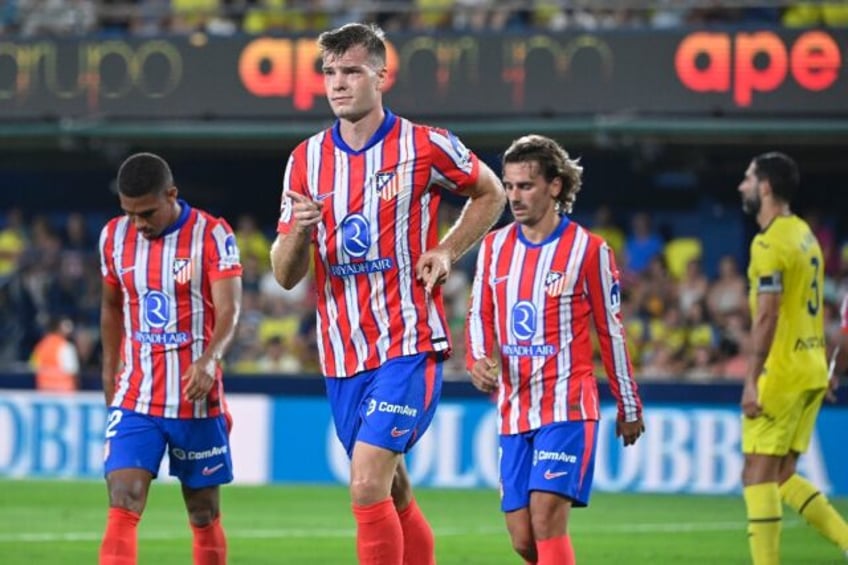 Atletico Madrid's Norwegian forward Alexander Sorloth (2L) celebrates scoring the equalise